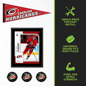Three HIDEit Hockey Puck Wall Mounts displaying Carolina Hurricanes pucks in a hockey wall mount display.