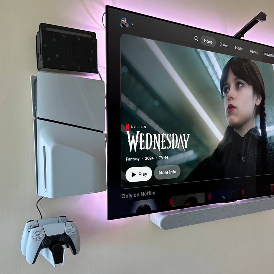 Marcelo_P’s award-winning afterHIDEit setup with a PS5 floating wall mount, Nintendo Switch dock mount, and DualSense controller holder for a clean, cable-free media wall.
