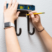 Gif showing the installation process for a HIDEit Vertical Bike Wall Mount. Perfect for garages, small apartments or homes!