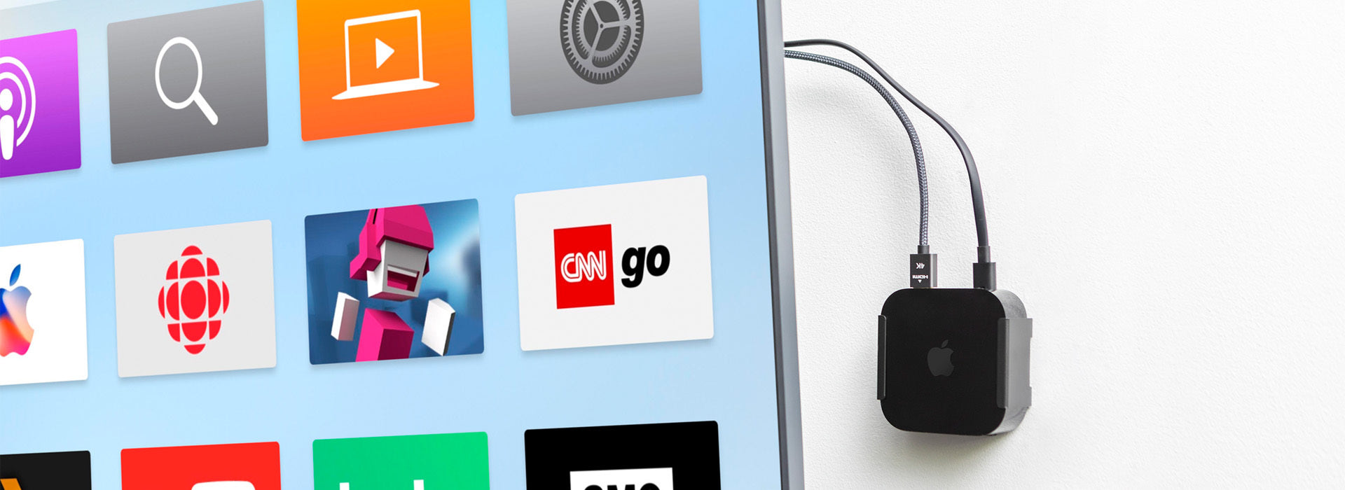 HIDEit Apple TV 4K 3rd gen wall mount installed behind TV, holding streaming device with cables neatly organized and hidden
