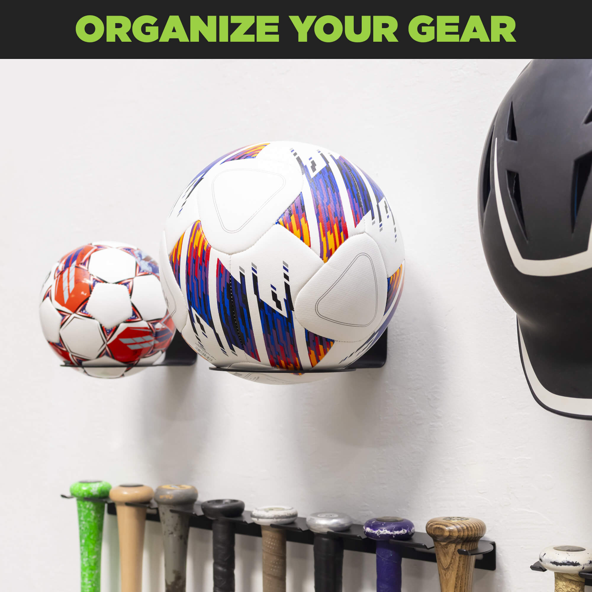 Garage wall with HIDEit Ball-XL Mount holding soccer ball – organize your sports equipment with wall mounted ball holders.