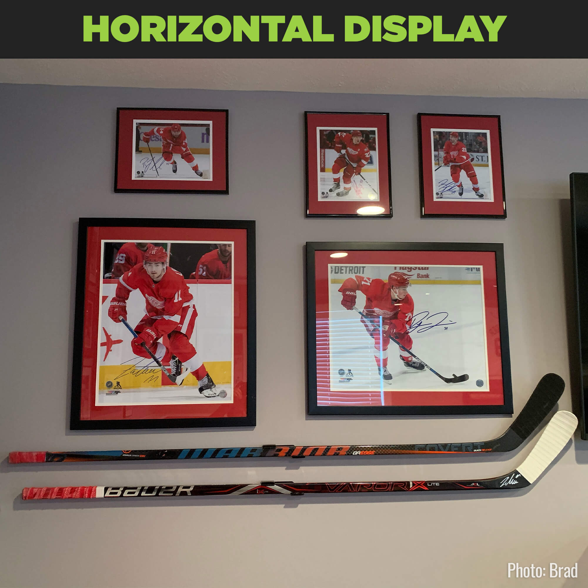 Two ice hockey sticks securely wall mounted using the HIDEit Hockey Stick Wall Mount.
