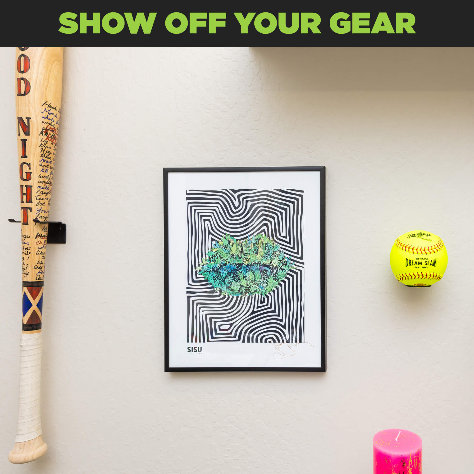 Wall mounted softball in a HIDEit Ball-M Medium Ball Wall Mount.