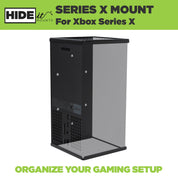 Xbox Series X console shown greyed out in a HIDEit Mount designed for the Xbox Series X.
