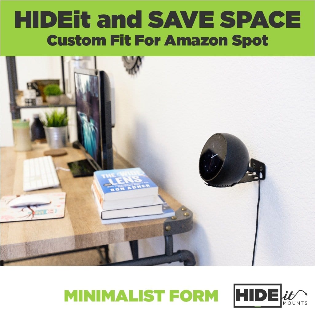 HIDEit Mounts wall mount for the Echo Spot mounted on the wall next to a desk.