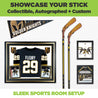 2 hockey sticks displayed on the wall with Las Vegas Golden Knights memorabilia. Perfect for any sports room. 