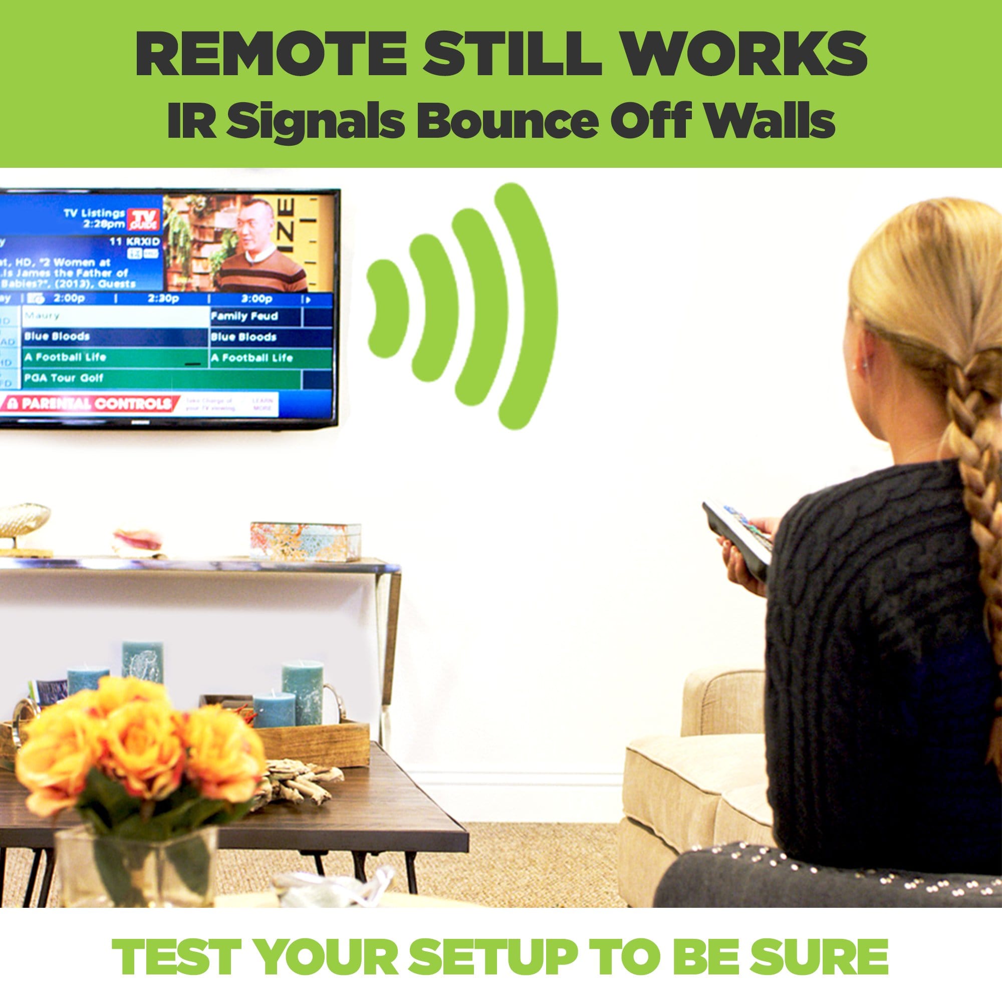 Small electronic device mounted behind the TV in a HIDEit wall mount.