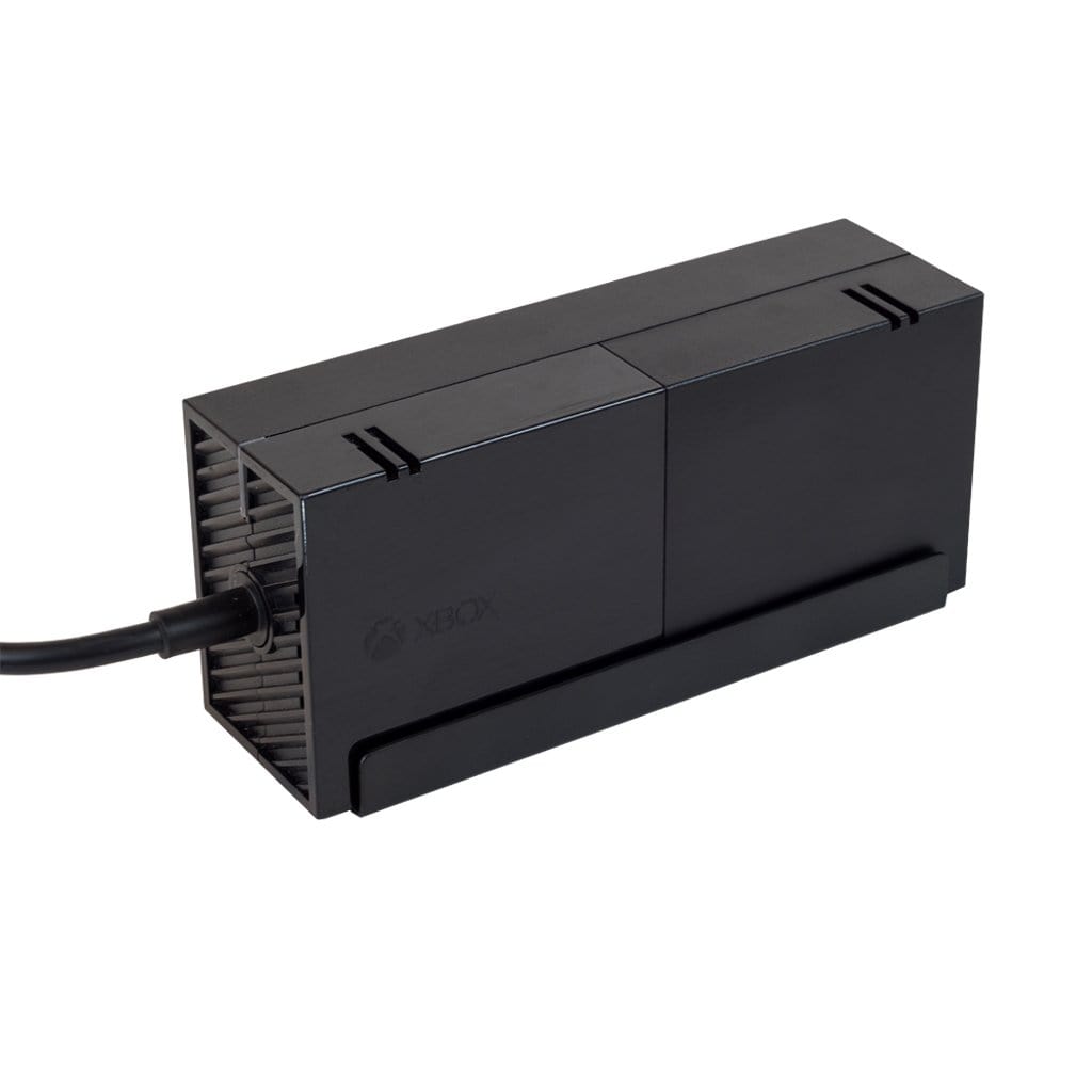 Power brick securely mounted in HIDEit Mounts wall mount for video game console power bricks.